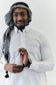 Arabic entrepreneur captures a self-portrait against an isolated white background, radiating ambition, determination, and corporate charisma, embodying the essence of a successful and influential business leader.