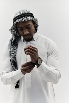 Arabic entrepreneur captures a self-portrait against an isolated white background, radiating ambition, determination, and corporate charisma, embodying the essence of a successful and influential business leader.