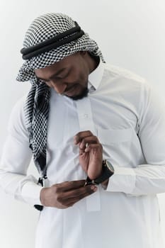 Arabic entrepreneur captures a self-portrait against an isolated white background, radiating ambition, determination, and corporate charisma, embodying the essence of a successful and influential business leader.