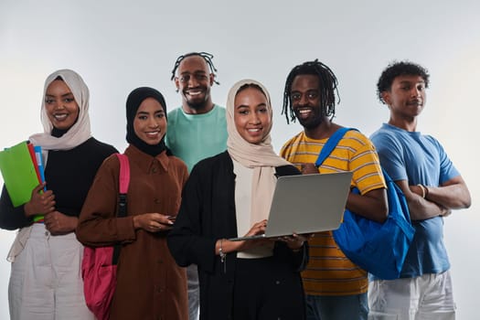 Group of diverse students engages in modern educational practices, utilizing a variety of technological tools such as laptops, tablets, and smartphones against a clean white background, exemplifying the contemporary approach to collaborative learning and information access.