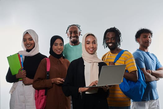 Group of diverse students engages in modern educational practices, utilizing a variety of technological tools such as laptops, tablets, and smartphones against a clean white background, exemplifying the contemporary approach to collaborative learning and information access.