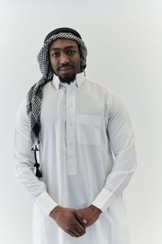 Arabic entrepreneur captures a self-portrait against an isolated white background, radiating ambition, determination, and corporate charisma, embodying the essence of a successful and influential business leader.