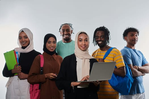 Group of diverse students engages in modern educational practices, utilizing a variety of technological tools such as laptops, tablets, and smartphones against a clean white background, exemplifying the contemporary approach to collaborative learning and information access.