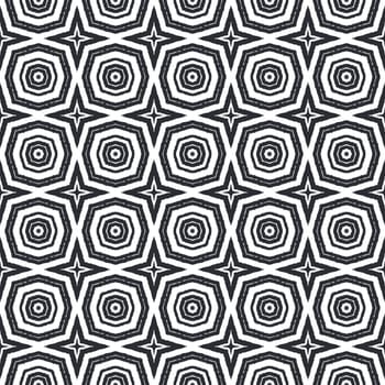 Ikat repeating swimwear design. Black symmetrical kaleidoscope background. Summer ikat sweamwear pattern. Textile ready mesmeric print, swimwear fabric, wallpaper, wrapping.