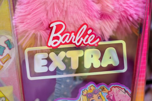 Tyumen, Russia-November 25, 2023: Barbie extra logo, produced by the American toy manufacturing company Mattel, Inc. Selective focus