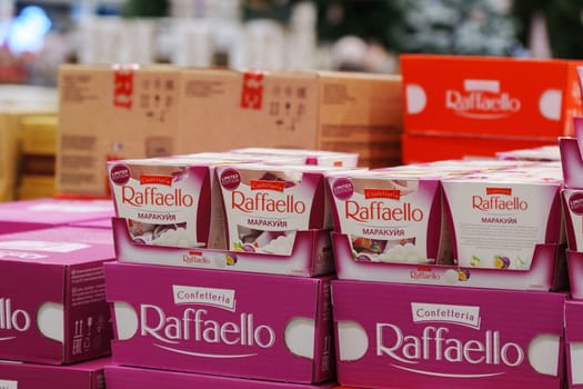 Tyumen, Russia-December 11, 2023: Raffaello is a spherical coconut almond candy passion fruit flavored.