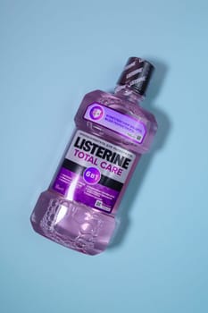 Tyumen, Russia-October 11, 2023: Listerine brand logo. Listerine mouthwash container.