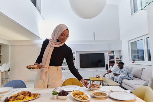 A young Arab woman gracefully prepares iftar for her family, delicately serving the table in the sacred month of Ramadan, capturing the essence of familial joy, cultural tradition, and spiritual devotion.