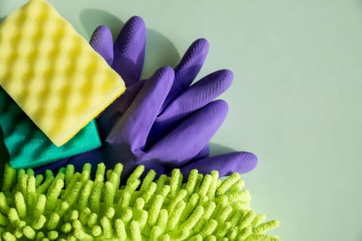 Colorful cleaning set for different surfaces in kitchen, bathroom and other rooms.