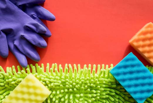 Cleaning kit isolated on white background. Set of napkins, rubber gloves and sponges. Professional kit for cleaning the house. Composition of cleaning tools.