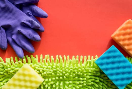 Cleaning kit isolated on white background. Set of napkins, rubber gloves and sponges. Professional kit for cleaning the house. Composition of cleaning tools.