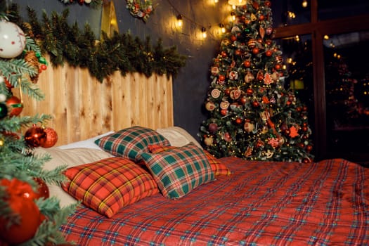 Winter Xmas Hygge home decor. Festive cozy bedroom in Skandinavian style with bed