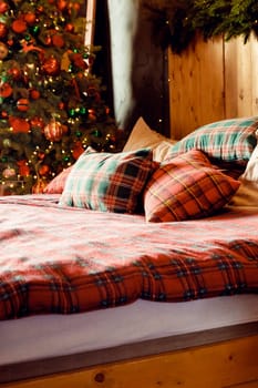 Winter Xmas Hygge home decor. Festive cozy bedroom in Skandinavian style with bed