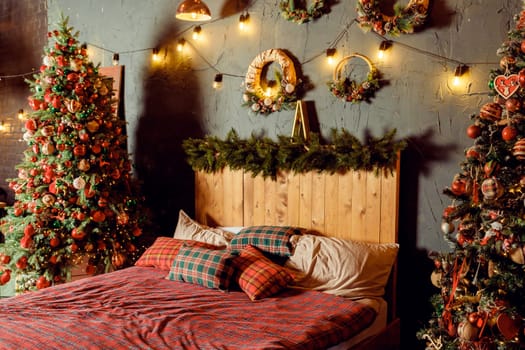 Winter Xmas Hygge home decor. Festive cozy bedroom in Skandinavian style with bed