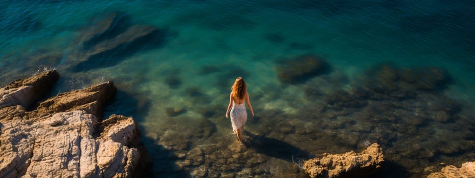 Girl on the seashore, top view. Selective focus. woman.