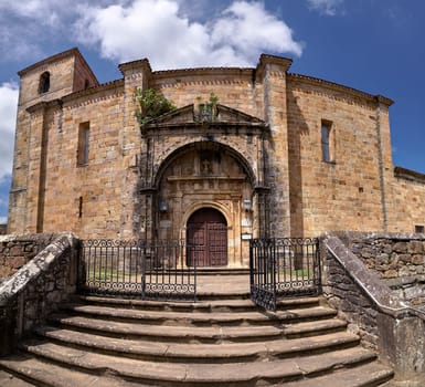 Church of San Pedro in Lierganes, on a cloudy day.Detail of door and staircase, metalic, panoramic