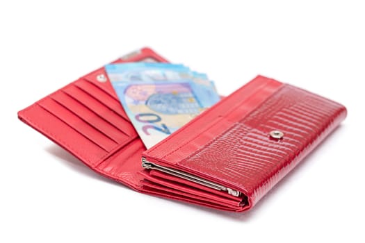 Opened Red Women Purse with 20 Euro Banknotes Inside - Isolated on White Background. A Wallet Full of Money Symbolizing Wealth, Success, Shopping and Social Status - Isolation