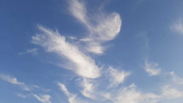bizarre clouds in the blue sky - air background. High quality photo with cirrus clouds.