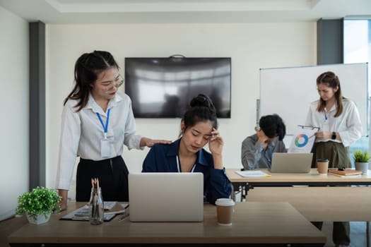 Employee sit at office meeting have stressful job situation, encourage colleagues, work stress concept.