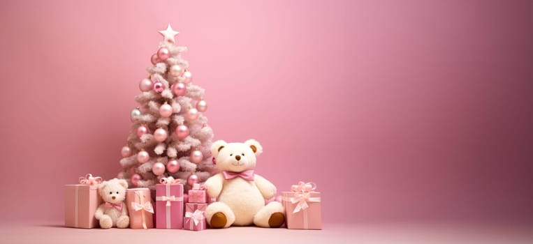 Christmas pink background with New Year tree and gift toys, Christmas gift box, fir tree and decorations on pink layout. Close-up with copy space.