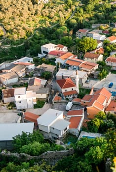 Top view Aerial view of Muslim neighborhood with mosque in city of Bar in Montenegro.