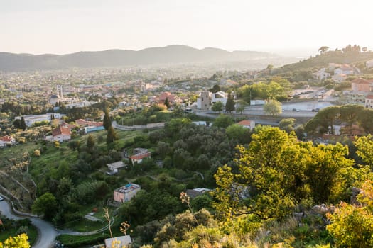 Mosque and panoramic cityscape of town Bar in Montenegro, aerial view.