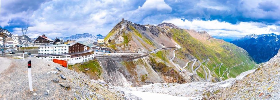 Stelvio mountain pass peak or Stilfser Joch scenic summer snow mountain panoramic view, border of Italy and Switzerland