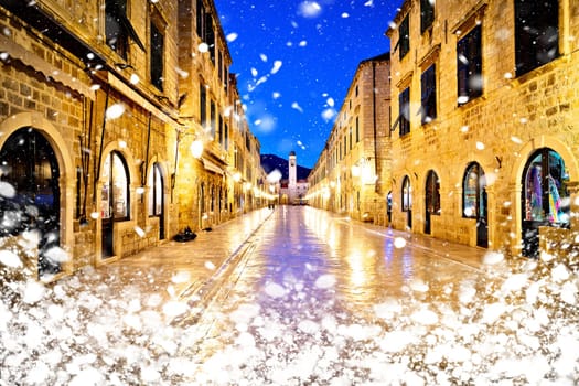 Famous Stradun street in Dubrovnik night winter snow view, Dalmatia region of Croatia