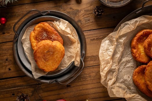 Traditional Portuguese Christmas Rabanadas. Spanish Torrijas on kitchen countertop.