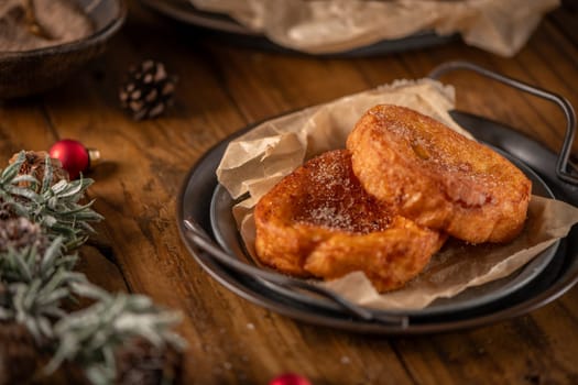 Traditional Portuguese Christmas Rabanadas. Spanish Torrijas on kitchen countertop.