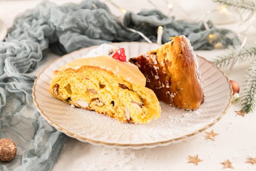 Bolo do Rei or King's Cake, Made for Christmas, Carnavale or Mardi Gras with Christmas season elements in Background.