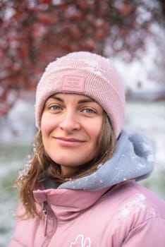 Winter Elegance: Portrait of a Beautiful Girl in a Snowy European Village