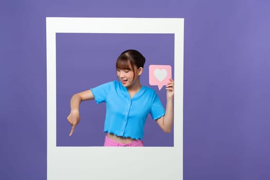 Photo of sweet impressed lady tacking photo getting likes isolated on violet background