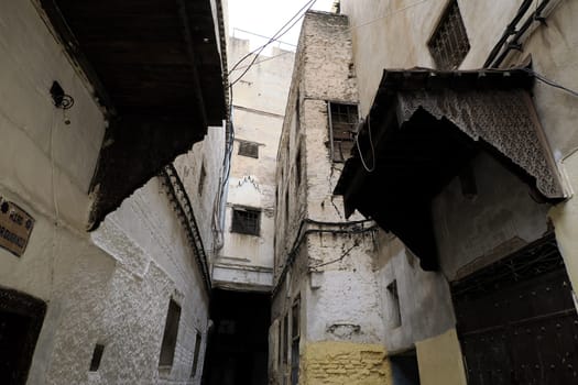 A Small street in Fez Fes medieval medina (old town). Morocco.