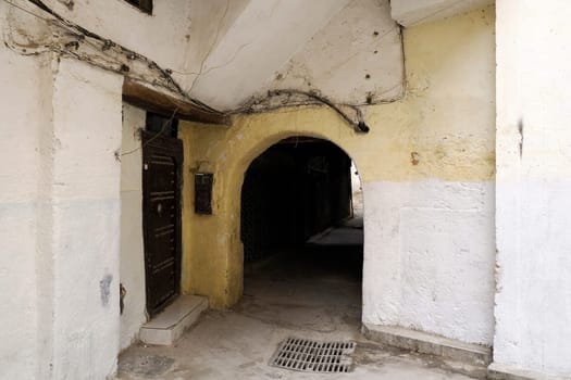 A Small street in Fez Fes medieval medina (old town). Morocco.