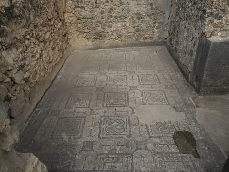 Mosaic of Volubilis Roman ruins in Morocco- Best-preserved Roman ruins located between the Imperial Cities of Fez and Meknes on a fertile plain surrounded by wheat fields.