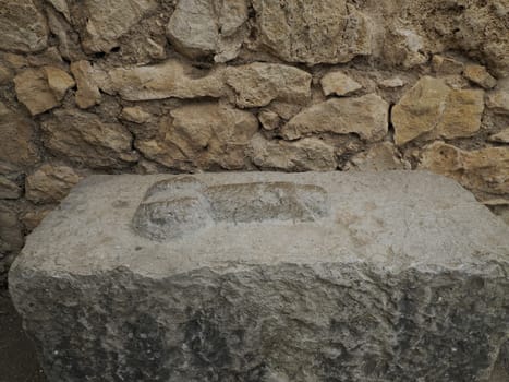 brothel penis sign at Volubilis Roman ruins in Morocco- Best-preserved Roman ruins located between the Imperial Cities of Fez and Meknes on a fertile plain