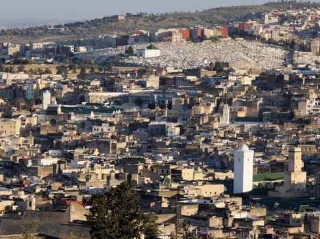 Aerial view of the Fez el Bali medina. Panorama cityscape of the oldest walled part of Fez, Morocco. detail of mosque tower