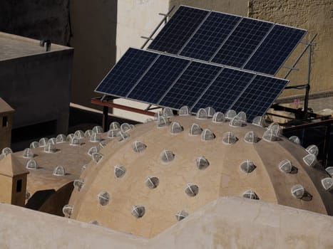 solar panel Aerial view of the Fez el Bali medina. Panorama cityscape of the oldest walled part of Fez, Morocco. Fes el Bali was founded as the capital of the Idrisid dynasty between 789 and 808 AD.