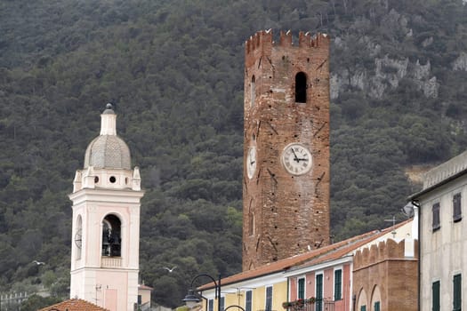 clock tower of Old noli medieval village liguria italy