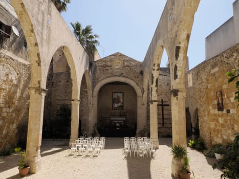 roof less church San Giovanni Battista San Giovannello Giudecca district ortigia syracuse old buildings street view on sunny day Sicily, Italy