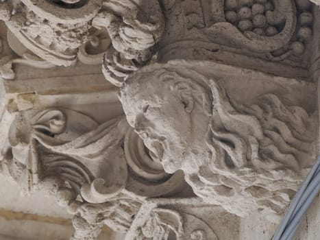 balcony sculpture ortigia syracuse old buildings street view on sunny day Sicily, Italy