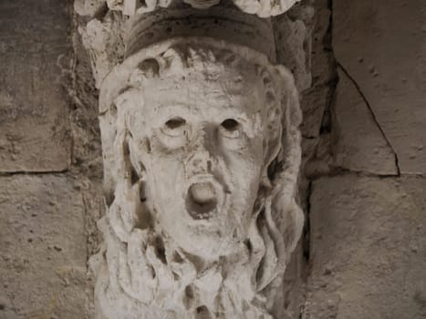 balcony sculpture ortigia syracuse old buildings street view on sunny day Sicily, Italy