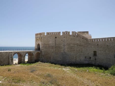 Maniace castle ortigia syracuse old buildings street view on sunny day Sicily, Italy