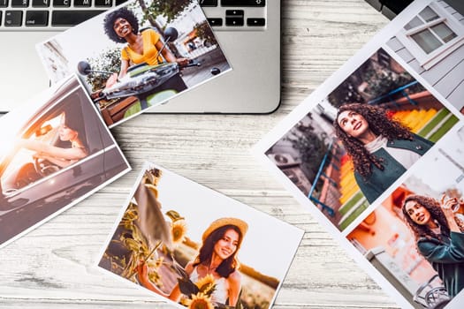 Printed colorful photos of women portraits. Printing photos hobby concept