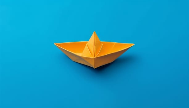 Creative image of white origami ships placed behind blue and orange paper ship representing concept of leadership on light background Copy space. Business concept design. Space for text