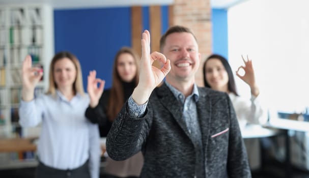 Group of business people showing hand gesture ok closeup. Quality of business education concept