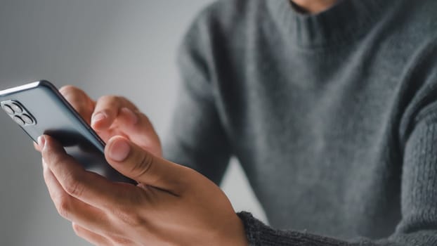 Human uses smartphone to check new mail. New email notification concept for business email communication and digital marketing. The inbox receives electronic message notifications. internet technology