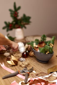 Homemade Craft christmas tools and decorations on table