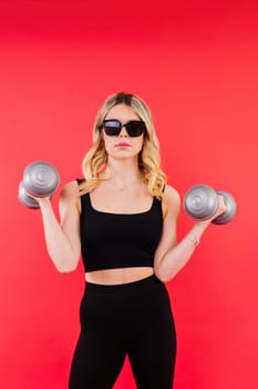 Woman, portrait and fitness, sunglasses and dumbbells, retro fashion accessory and muscle trainings